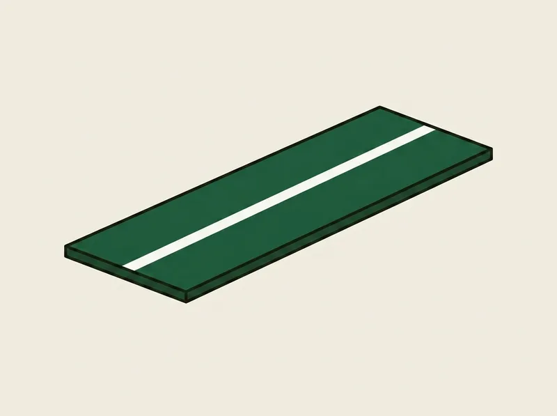 Illustration of a long flat practice board with a pale streak marked across its turf-like surface