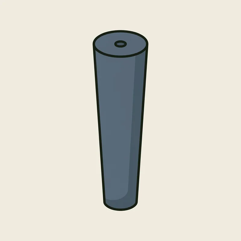 A golf club grip standing upright with its capped end facing the viewer and a small vent hole in the centre